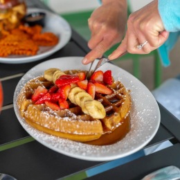plate of waffles on table