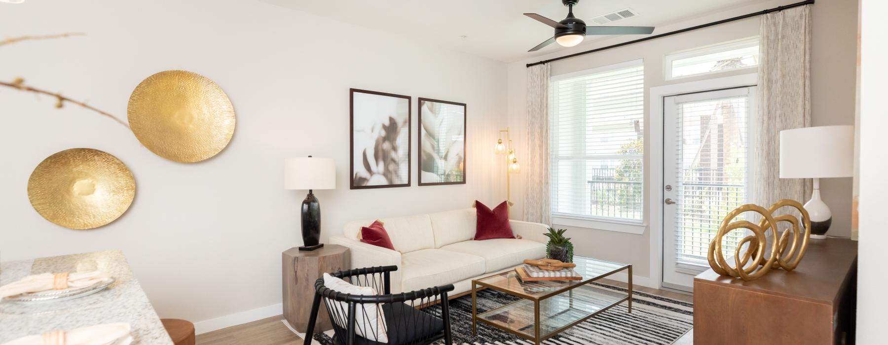a living room with a couch and a table